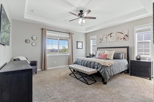 7074 S Vandriver Ct, Aurora, CO 80016 - bedroom featuring a raised ceiling, crown molding, light carpet, and a ceiling fan