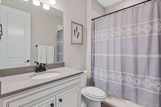 7074 S Vandriver Ct, Aurora, CO 80016 - bathroom featuring vanity and toilet