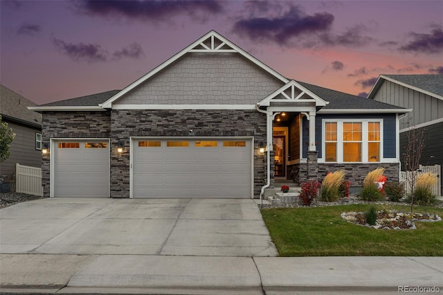 craftsman house with a garage