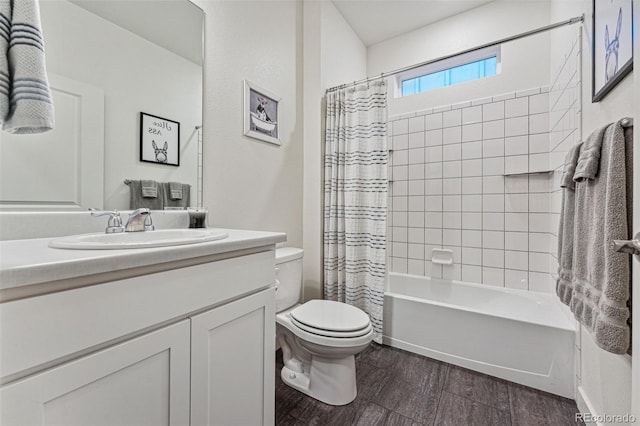 full bathroom with shower / tub combo, vanity, hardwood / wood-style flooring, and toilet