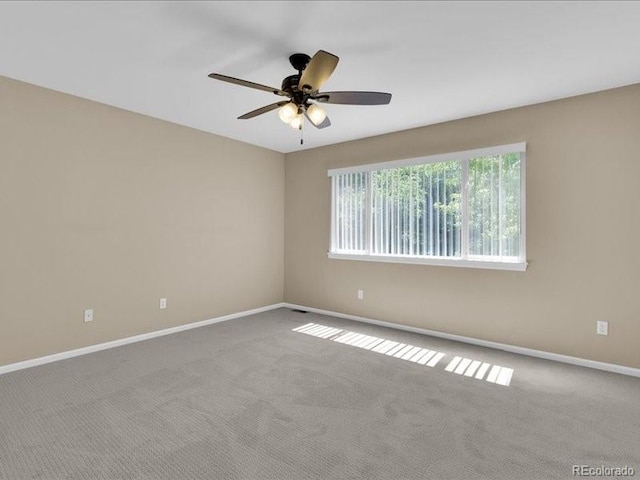 8906 Miners Dr, Highlands Ranch, CO 80126 - spare room featuring a ceiling fan and carpet flooring