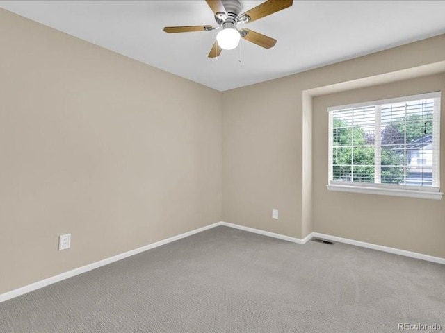 8906 Miners Dr, Highlands Ranch, CO 80126 - carpeted empty room with baseboards and a ceiling fan