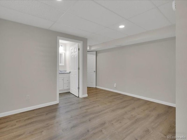8906 Miners Dr, Highlands Ranch, CO 80126 - unfurnished bedroom with a drop ceiling, wood finished floors, ensuite bath, and recessed lighting