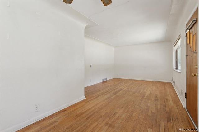1585 S University Blvd, Denver, CO 80210 - unfurnished room with light wood-style floors and a ceiling fan