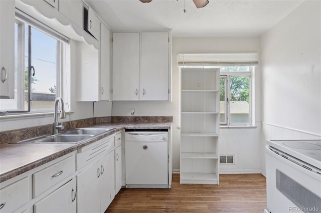 1585 S University Blvd, Denver, CO 80210 - kitchen featuring white appliances, dark wood-style flooring, white cabinets, and wainscoting