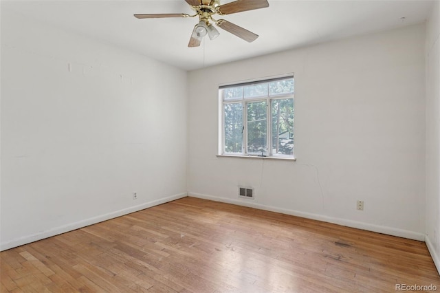 1585 S University Blvd, Denver, CO 80210 - spare room featuring light wood-style flooring and ceiling fan