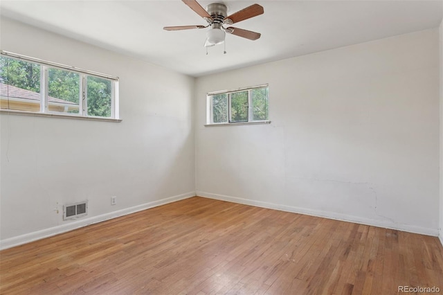 1585 S University Blvd, Denver, CO 80210 - empty room featuring light wood finished floors and ceiling fan