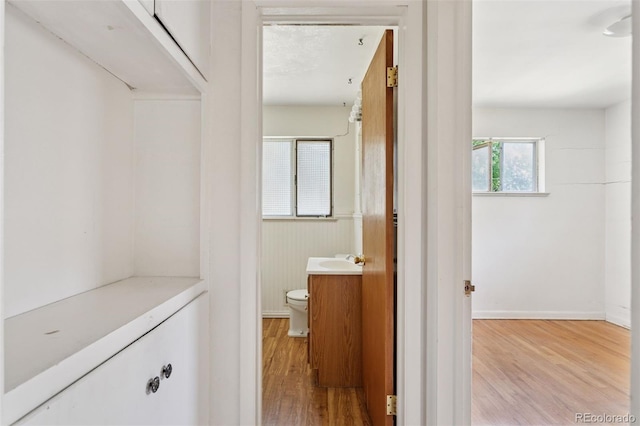 1585 S University Blvd, Denver, CO 80210 - bathroom with vanity and wood finished floors