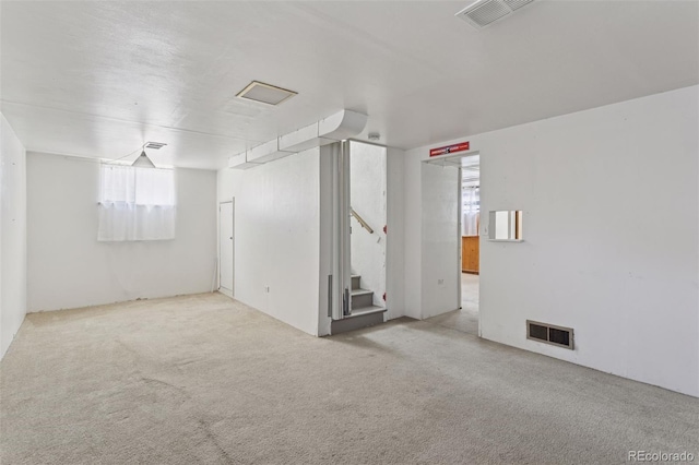 1585 S University Blvd, Denver, CO 80210 - carpeted empty room featuring plenty of natural light and stairway