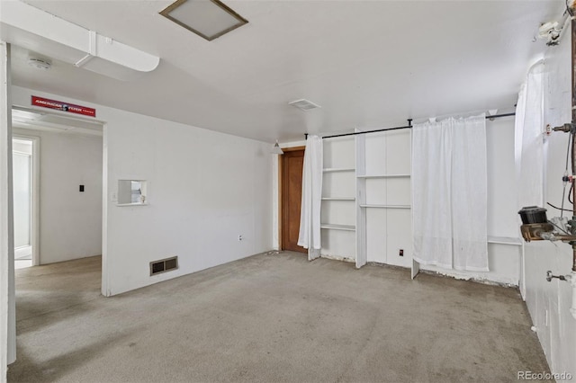 1585 S University Blvd, Denver, CO 80210 - spare room with carpet flooring and a smoke detector