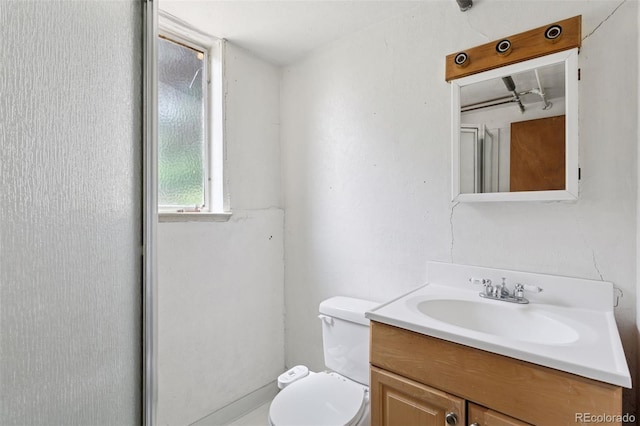 1585 S University Blvd, Denver, CO 80210 - bathroom featuring vanity and toilet