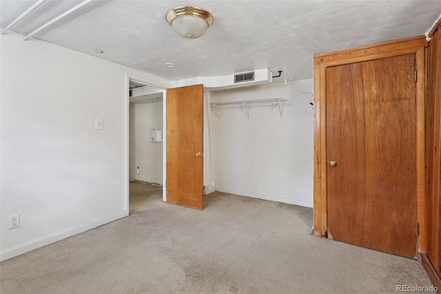 1585 S University Blvd, Denver, CO 80210 - unfurnished bedroom featuring a closet and carpet flooring