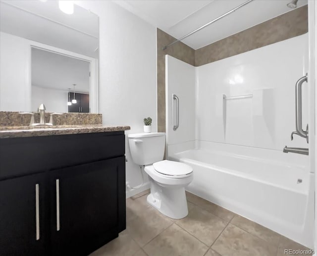 1062 Rockhurst Dr Unit 302, Highlands Ranch, CO 80129 - full bathroom with tile patterned flooring, shower / washtub combination, toilet, and vanity