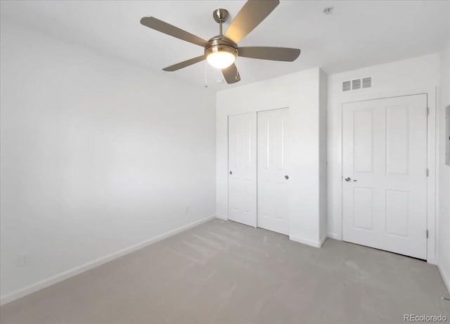 1062 Rockhurst Dr Unit 302, Highlands Ranch, CO 80129 - unfurnished bedroom with carpet flooring, baseboards, a closet, and ceiling fan