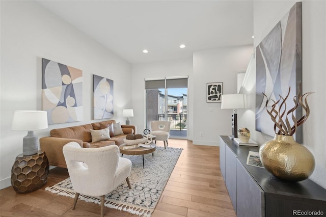 7812 W 43rd Pl, Wheat Ridge, CO 80033 - living room featuring light wood-type flooring, recessed lighting, and baseboards