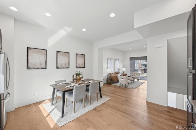 7812 W 43rd Pl, Wheat Ridge, CO 80033 - dining area featuring light wood-style flooring, baseboards, and recessed lighting