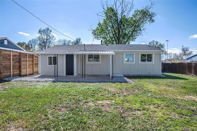 back of property featuring a patio area, board and batten siding, and roof with shingles
