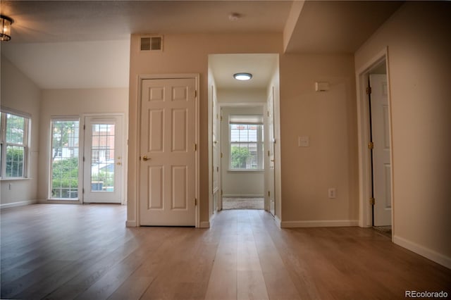 2980 W Centennial Dr Unit L, Littleton, CO 80123 - foyer entrance with light wood finished floors and baseboards