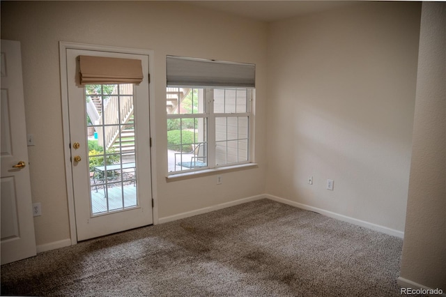 2980 W Centennial Dr Unit L, Littleton, CO 80123 - doorway to outside with carpet flooring and baseboards