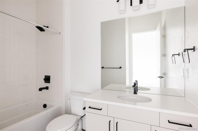 full bathroom featuring shower / bathing tub combination, vanity, and toilet