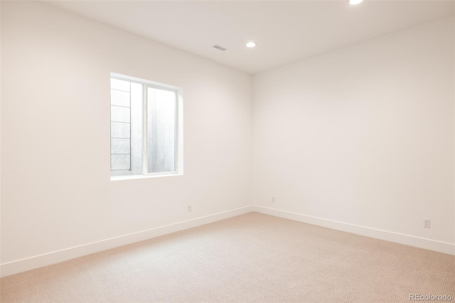 unfurnished room with carpet floors