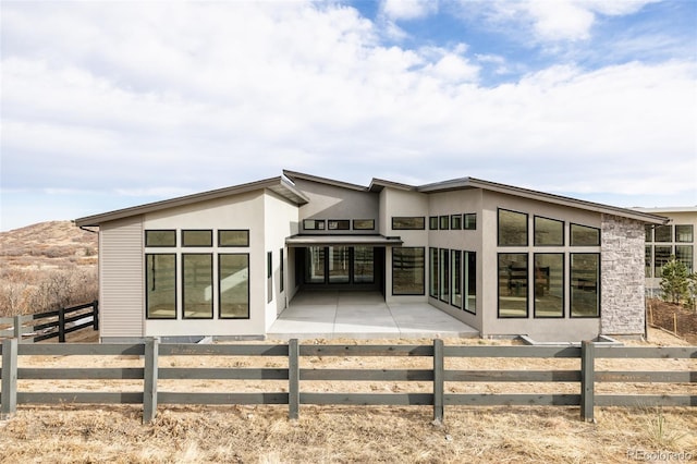 rear view of house with a patio area