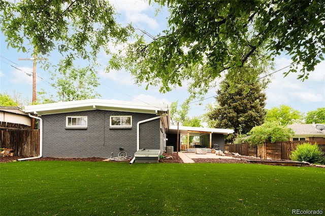 7695 Quitman St, Westminster, CO 80030 - back of property featuring brick siding