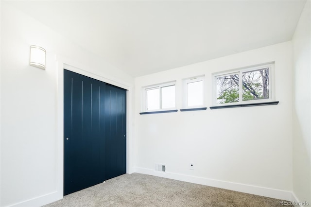 7695 Quitman St, Westminster, CO 80030 - unfurnished bedroom featuring carpet, multiple windows, baseboards, and a closet