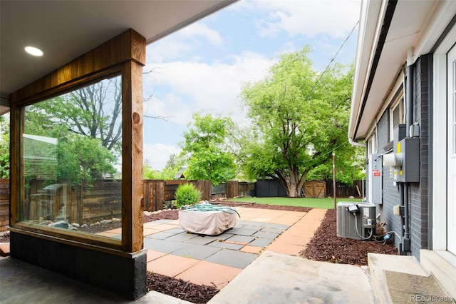 7695 Quitman St, Westminster, CO 80030 - fenced backyard with cooling unit and a patio