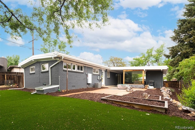 7695 Quitman St, Westminster, CO 80030 - rear view of property with brick siding, cooling unit, and crawl space