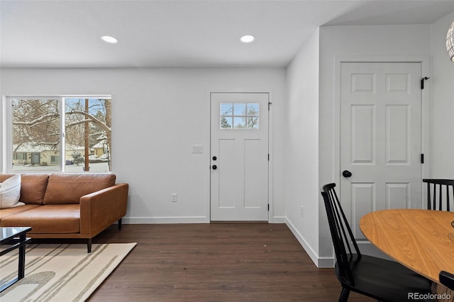 foyer featuring dark hardwood / wood-style floors and plenty of natural light