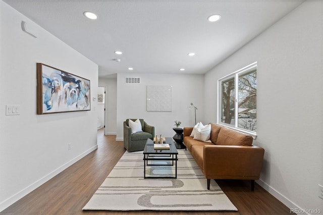 living room with dark wood-type flooring