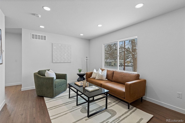 living room with hardwood / wood-style floors