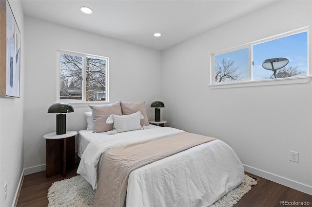 bedroom featuring dark hardwood / wood-style floors