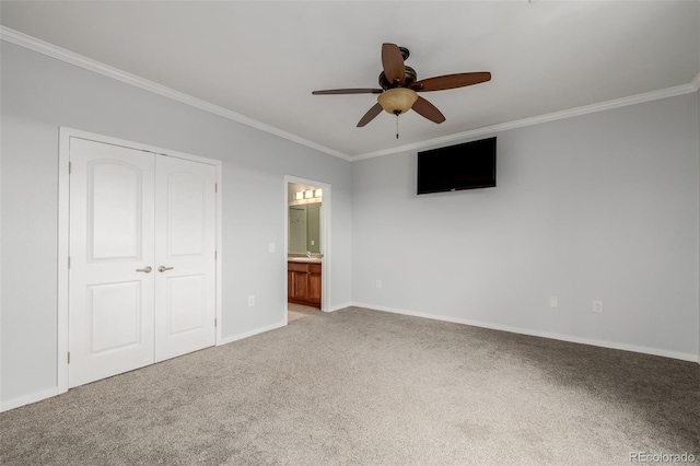13456 Via Varra Unit 401, Broomfield, CO 80020 - unfurnished bedroom with ornamental molding, carpet floors, connected bathroom, ceiling fan, and a closet