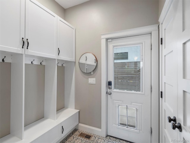 mudroom featuring light tile patterned floors