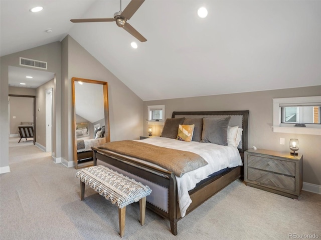 carpeted bedroom featuring lofted ceiling and ceiling fan