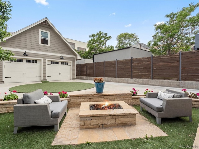 view of patio featuring an outdoor living space with a fire pit