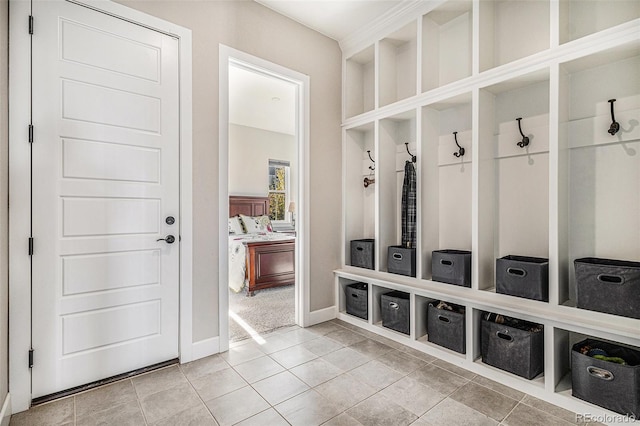 mudroom with tile patterned flooring