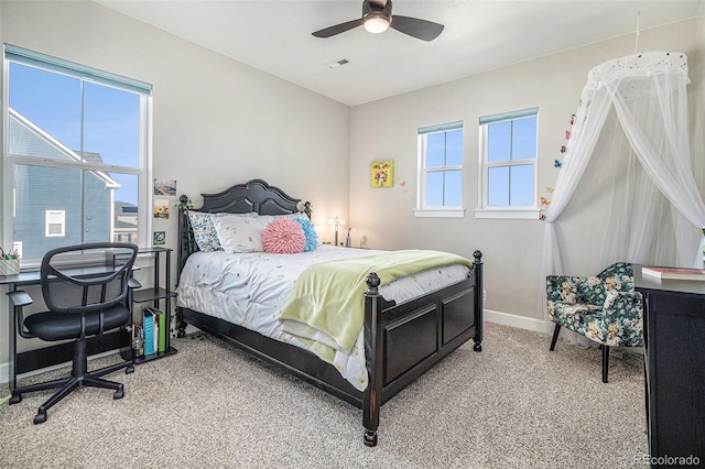 carpeted bedroom featuring ceiling fan