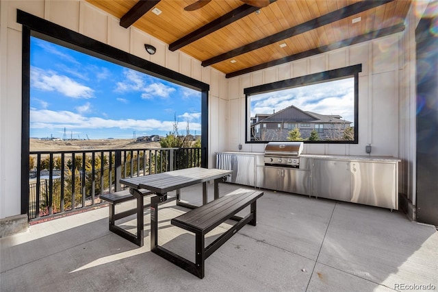 view of patio / terrace with area for grilling and an outdoor kitchen