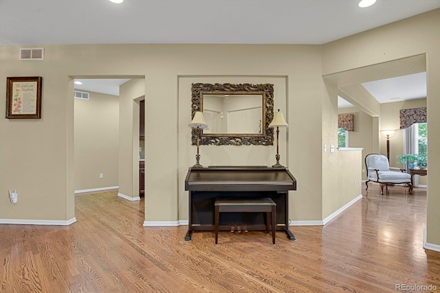 13787 Josephine Ct, Thornton, CO 80602 - hallway featuring wood finished floors and recessed lighting