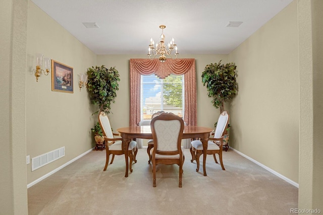 13787 Josephine Ct, Thornton, CO 80602 - dining space featuring a chandelier and light colored carpet