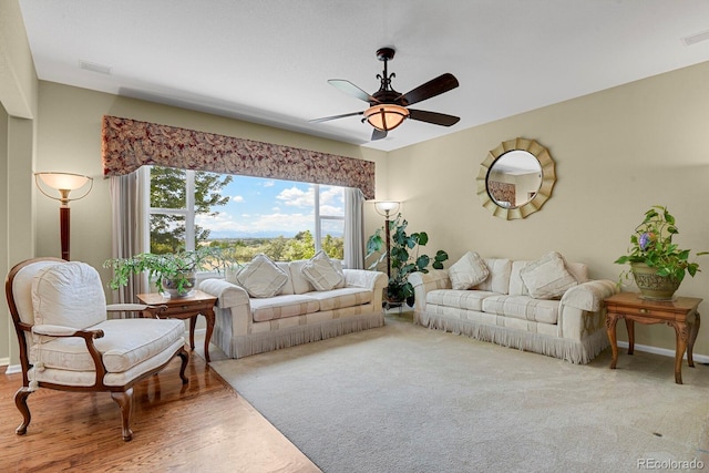 13787 Josephine Ct, Thornton, CO 80602 - living room featuring a ceiling fan and baseboards