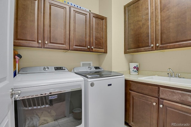 13787 Josephine Ct, Thornton, CO 80602 - laundry room with cabinet space, separate washer and dryer, and tile patterned flooring