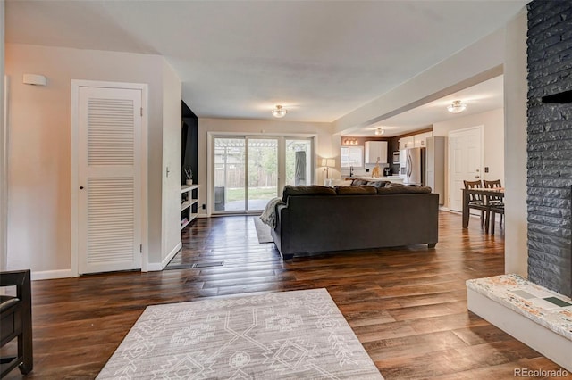 living room featuring dark hardwood / wood-style floors