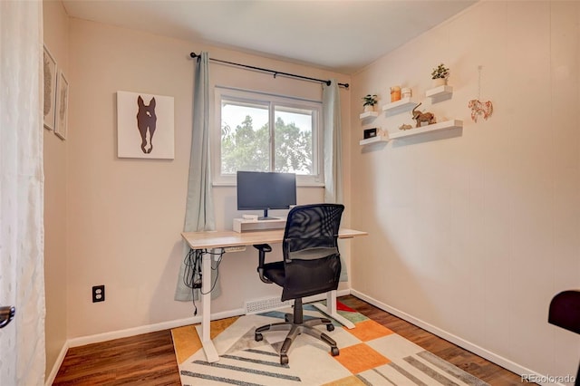 home office featuring hardwood / wood-style flooring