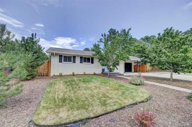 view of front of home with a front lawn