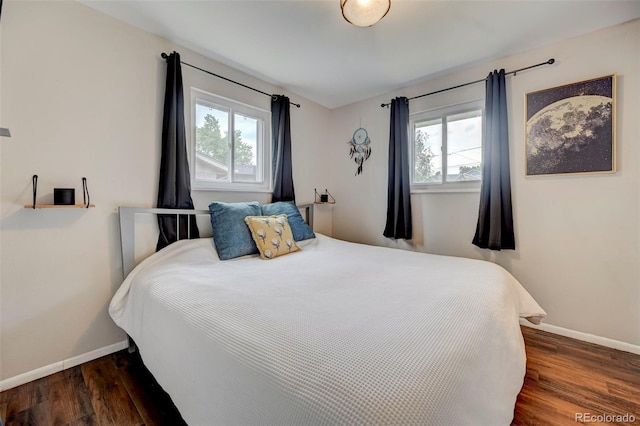 bedroom featuring dark hardwood / wood-style floors