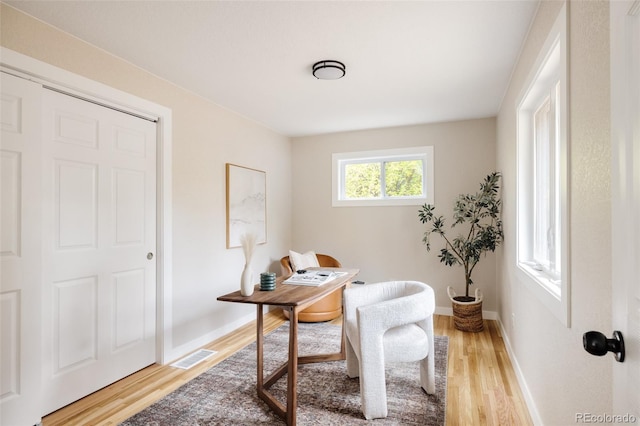 office space featuring hardwood / wood-style floors